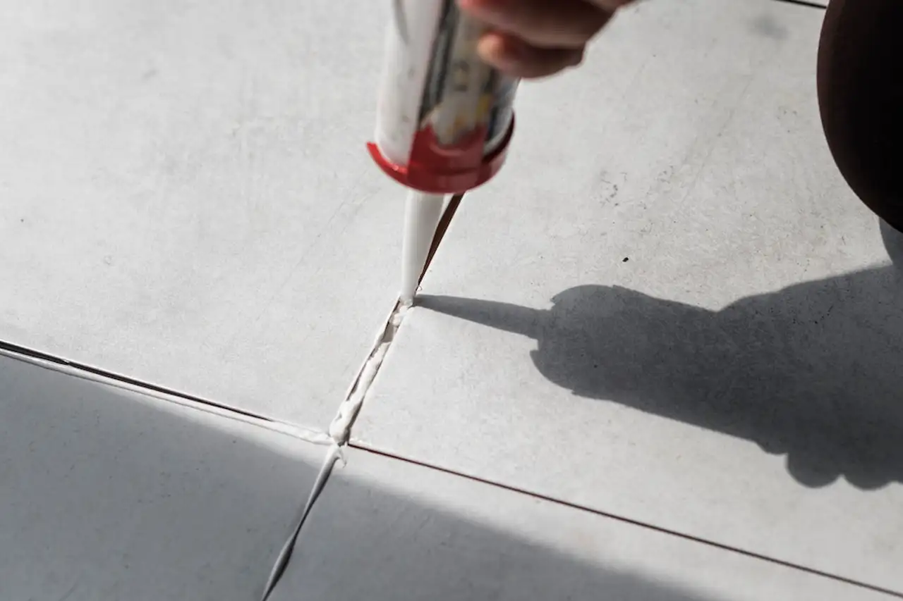 Grout sealing process to protect tiles from moisture